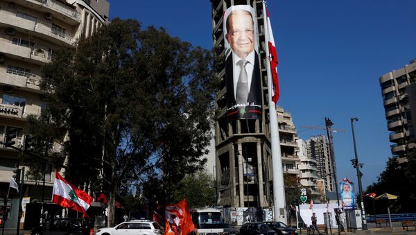 A picture of Christian politician and FPM founder Michel Aoun is seen on a building prior to presidential elections in Beirut, Lebanon October 30, 2016 - Sputnik International