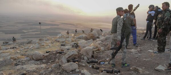 Mosul natives take up arms to fight Daesh Mosul natives take up arms to fight Daesh - Sputnik International