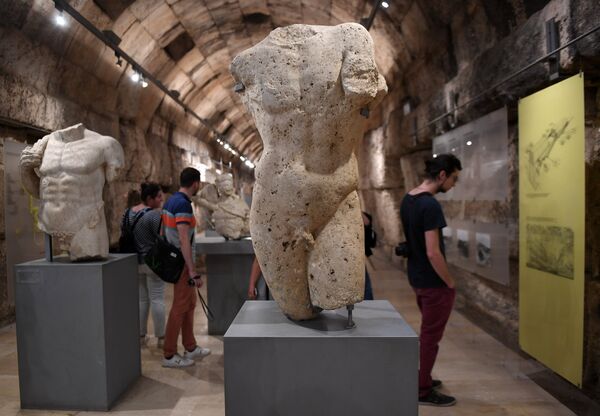 Visitors seen at the museum of the temple complex in the ancient Lebanese city of Baalbek. - Sputnik International
