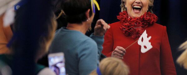 US Democratic presidential nominee Hillary Clinton holds a Halloween mask (File) US Democratic presidential nominee Hillary Clinton holds a Halloween mask (File) - Sputnik International