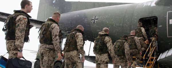 German soldiers enter a Transall C-160 cargo plane at the military airbase Penzing, 50 kilometers (28 miles) west of Munich, southern Germany, on Saturday, Dec. 18, 2004 German soldiers enter a Transall C-160 cargo plane at the military airbase Penzing, 50 kilometers (28 miles) west of Munich, southern Germany, on Saturday, Dec. 18, 2004 - Sputnik International