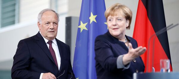German Chancellor Angela Merkel and Swiss President Johann Schneider-Ammann attend a media conference in the chancellery in Berlin, Germany, November 2, 2016. - Sputnik International