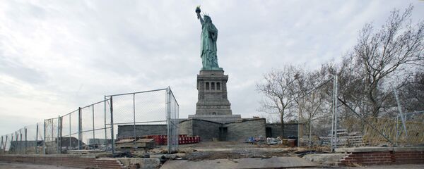 The Statue of Liberty stands beyond parts of a brick walkway damaged in Superstorm Sandy on Liberty Island in New York (File) The Statue of Liberty stands beyond parts of a brick walkway damaged in Superstorm Sandy on Liberty Island in New York (File) - Sputnik International