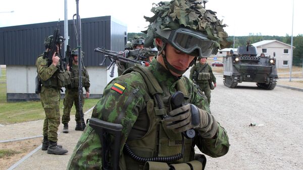 Lithuanian army soldiers take part in an exercise following the official opening of a military training centre for urban warfare in Pabrade, Lithuania, on August 30, 2016 - Sputnik International