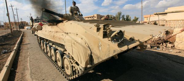 Military vehicles of Iraqi army take part in an operation against Islamic State militants in Qaraqosh, near Mosul, Iraq, November 2, 2016 Military vehicles of Iraqi army take part in an operation against Islamic State militants in Qaraqosh, near Mosul, Iraq, November 2, 2016 - Sputnik International
