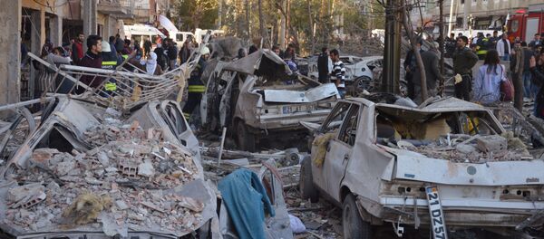 Damaged cars are seen on a street after a blast in Diyarbakir, Turkey, November 4, 2016. Damaged cars are seen on a street after a blast in Diyarbakir, Turkey, November 4, 2016. - Sputnik International