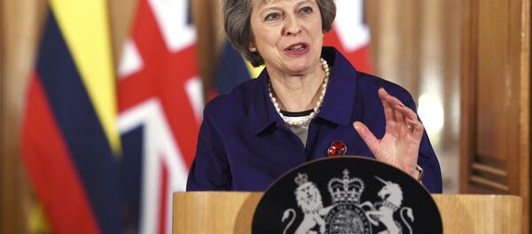 Britain's Prime Minister Theresa May and Colombia's President Juan Manuel Santos (not shown) speak to journalists after their bilateral meeting at 10 Downing Street in London, November 2, 2016. Britain's Prime Minister Theresa May and Colombia's President Juan Manuel Santos (not shown) speak to journalists after their bilateral meeting at 10 Downing Street in London, November 2, 2016. - Sputnik International