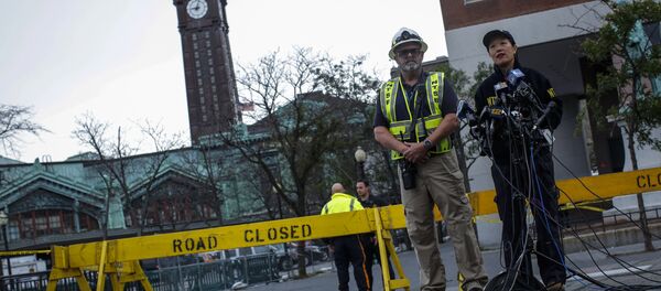 T Bella Dinh-Zarr (R), Vice Chairman of US National Transportation, speaks during a press conference outside the New Jersey transit rail station in Hoboken, New Jersey September 29, 2016. A packed commuter train crashed into the station in New Jersey during the morning rush hour with one person reported killed and more than 100 injured, many of them in critical condition. - Sputnik International