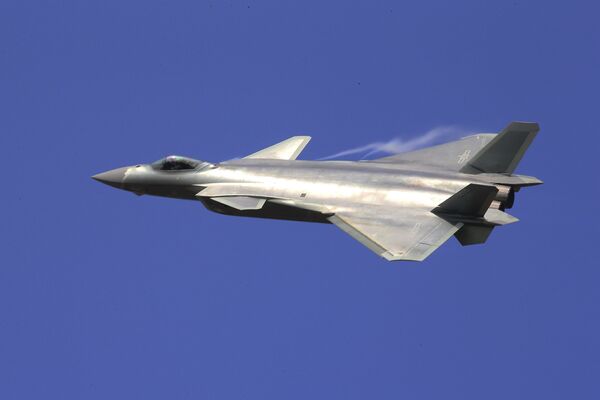 In this photo provided by China's Xinhua News Agency, the J-20 stealth fighter jet flies at the China's International Aviation and Aerospace Exhibition in Zhuhai on Tuesday, Nov. 1, 2016 In this photo provided by China's Xinhua News Agency, the J-20 stealth fighter jet flies at the China's International Aviation and Aerospace Exhibition in Zhuhai on Tuesday, Nov. 1, 2016 - Sputnik International