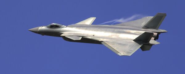 In this photo provided by China's Xinhua News Agency, the J-20 stealth fighter jet flies at the China's International Aviation and Aerospace Exhibition in Zhuhai on Tuesday, Nov. 1, 2016 In this photo provided by China's Xinhua News Agency, the J-20 stealth fighter jet flies at the China's International Aviation and Aerospace Exhibition in Zhuhai on Tuesday, Nov. 1, 2016 - Sputnik International