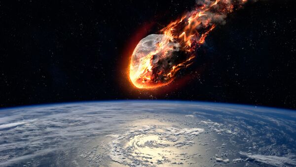 Meteor glowing as it enters the Earth's atmosphere. Elements of this image furnished by NASA. - Sputnik International