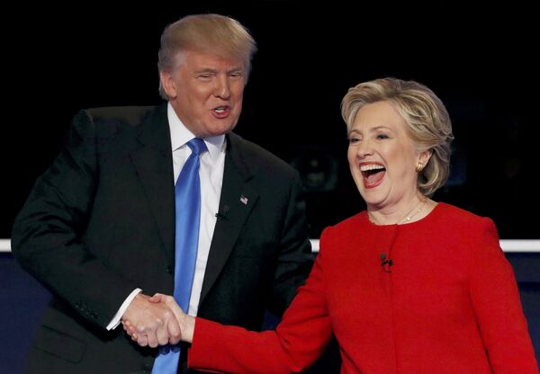 Republican U.S. presidential nominee Donald Trump shakes hands with Democratic U.S. presidential nominee Hillary Clinton Republican U.S. presidential nominee Donald Trump shakes hands with Democratic U.S. presidential nominee Hillary Clinton - Sputnik International