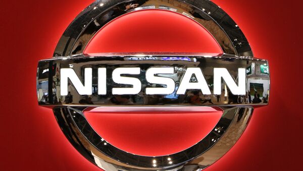 The logo of Japanese auto giant Nissan Motor is seen at the Tokyo Motor Show on November 2, 2015. - Sputnik International