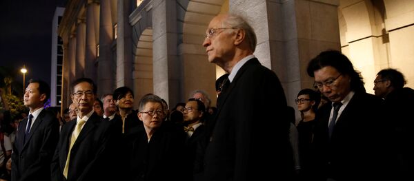 Legislator and barrister Dennis Kwok (L) and Former legislator Martin Lee (2nd-L) wearing black stage a silent protest to the Court of Final Appeal against China's parliament passed an interpretation of Basic Law, in Hong Kong, China November 8, 2016 Legislator and barrister Dennis Kwok (L) and Former legislator Martin Lee (2nd-L) wearing black stage a silent protest to the Court of Final Appeal against China's parliament passed an interpretation of Basic Law, in Hong Kong, China November 8, 2016 - Sputnik International