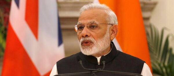 India's Prime Minister Narendra Modi reads a joint statement with his British counterpart Theresa May (unseen) at Hyderabad House in New Delhi, India, November 7, 2016 - Sputnik International