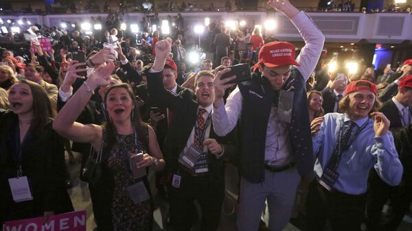 Supporters of U.S. Republican presidential nominee Donald Trump celebrate the results from Ohio and Florida at his election night rally in Manhattan, New York, U.S., November 8, 2016 - Sputnik International