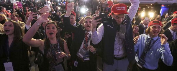 Supporters of U.S. Republican presidential nominee Donald Trump celebrate the results from Ohio and Florida at his election night rally in Manhattan, New York, U.S., November 8, 2016 - Sputnik International