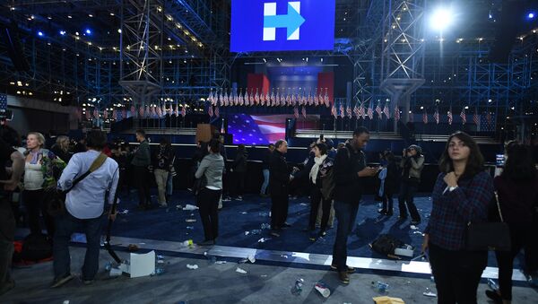 Supporters of Democratic presidential nominee Hillary Clinton walk through convention center at the end of election night at the Jacob K. Javits Convention Center in New York on November 8, 2016 - Sputnik International