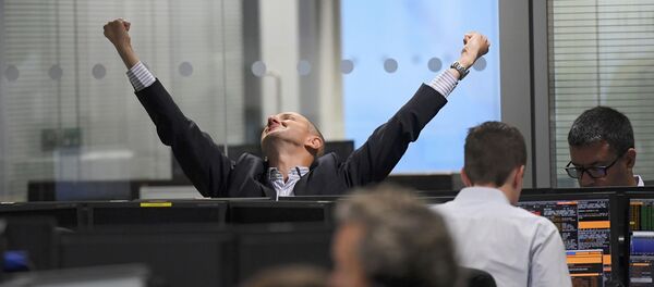 A trader stretches at BGC Partners after Donald Trump won the U.S. Presidential election, in London, Britain, November 9, 2016 - Sputnik International