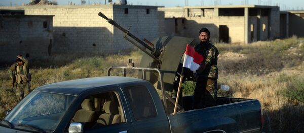 A Syrian army fighter in the village of Kaukab in the Hama province - Sputnik International