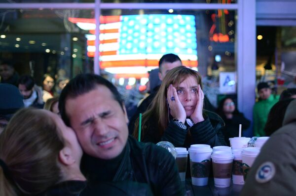 Supporters of Democratic candidate Hillary Clinton on Times Square in New York follow the preliminary vote results Supporters of Democratic candidate Hillary Clinton on Times Square in New York follow the preliminary vote results - Sputnik International