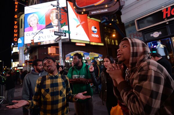 Supporters of Democratic candidate Hillary Clinton on Times Square in New York follow the preliminary vote results Supporters of Democratic candidate Hillary Clinton on Times Square in New York follow the preliminary vote results - Sputnik International