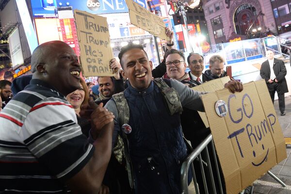 Supporters of Republican candidate Donald Trump on Times Square in New York follow the preliminary vote results Supporters of Republican candidate Donald Trump on Times Square in New York follow the preliminary vote results - Sputnik International