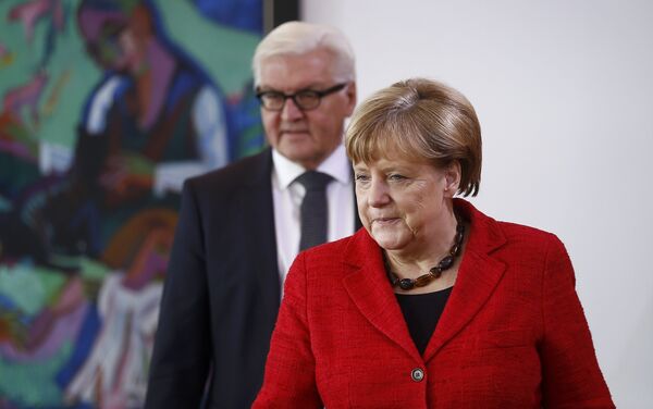 German Chancellor Angela Merkel and Foreign Minister Frank-Walter Steinmeier arrive for the weekly cabinet meeting at the Chancellery in Berlin, Germany, November 9, 2016 German Chancellor Angela Merkel and Foreign Minister Frank-Walter Steinmeier arrive for the weekly cabinet meeting at the Chancellery in Berlin, Germany, November 9, 2016 - Sputnik International