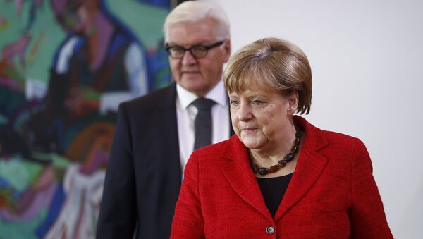 German Chancellor Angela Merkel and Foreign Minister Frank-Walter Steinmeier arrive for the weekly cabinet meeting at the Chancellery in Berlin, Germany, November 9, 2016 - Sputnik International