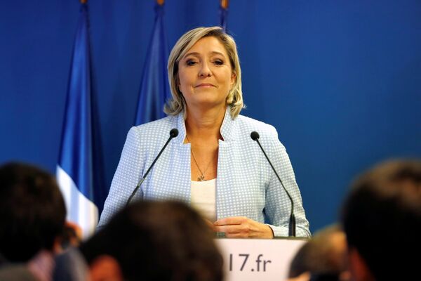 Marine Le Pen, French National Front (FN) political party leader, delivers a statement on U.S. election results at the party headquarters in Nanterre, France, November 9, 2016 Marine Le Pen, French National Front (FN) political party leader, delivers a statement on U.S. election results at the party headquarters in Nanterre, France, November 9, 2016 - Sputnik International