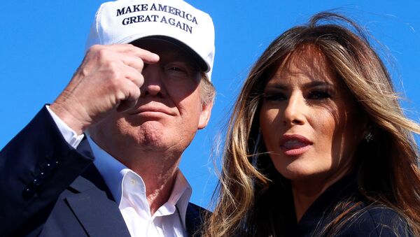 Republican presidential nominee Donald Trump points at his wife Melania Trump at a campaign rally in Wilmington, North Carolina, U.S. November 5, 2016 - Sputnik International