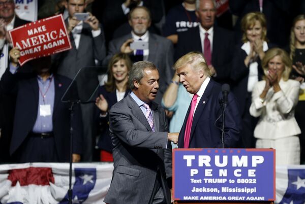 Donald Trump welcomes Nigel Farage, left, ex-leader of the British UKIP party, to speak at a campaign rally in Jackson, Miss., Wednesday, Aug. 24, 2016. Donald Trump welcomes Nigel Farage, left, ex-leader of the British UKIP party, to speak at a campaign rally in Jackson, Miss., Wednesday, Aug. 24, 2016. - Sputnik International