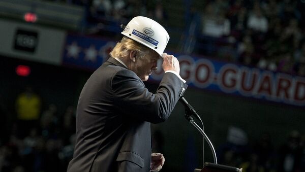 US Republican presidential candidate Donald Trump puts on a miner's hat while speaking during a rally on May 5, 2016 in Charleston, West Virginia - Sputnik International