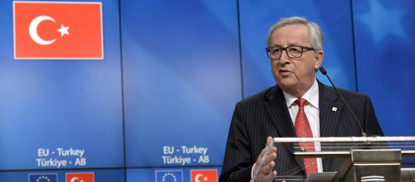 European Union Commission President Jean-Claude Juncker talks to the media at the end of an European Union Summit held at the EU Council building in Brussels, Friday March 18, 2016. European Union Commission President Jean-Claude Juncker talks to the media at the end of an European Union Summit held at the EU Council building in Brussels, Friday March 18, 2016. - Sputnik International