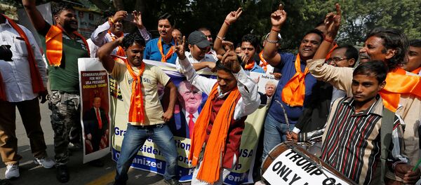 Members of Hindu Sena, a right-wing Hindu group, celebrate Republican presidential nominee Donald Trump's victory in the U.S. elections, in New Delhi, India, November 9, 2016 - Sputnik International