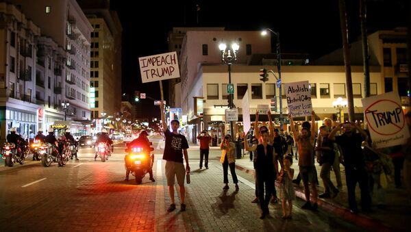 Demonstrators walk through Downtown San Diego in protest to the election of Republican Donald Trump as the president of the United States in San Diego, California, U.S. November 9, 2016 - Sputnik International
