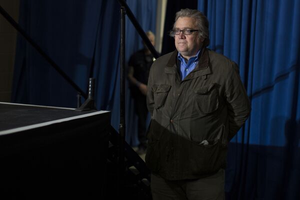 Stephen Bannon, campaign CEO for Republican presidential candidate, Donald Trump, looks on as Trump speaks during a campaign rally, Saturday, Nov. 5, 2016, in Denver Stephen Bannon, campaign CEO for Republican presidential candidate, Donald Trump, looks on as Trump speaks during a campaign rally, Saturday, Nov. 5, 2016, in Denver - Sputnik International