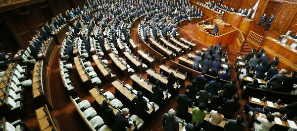 Ruling coalition lawmakers stand to approve the passage of the Trans-Pacific Partnership (TPP) free trade deal in the lower house of the parliament in Tokyo on November 10, 2016 Ruling coalition lawmakers stand to approve the passage of the Trans-Pacific Partnership (TPP) free trade deal in the lower house of the parliament in Tokyo on November 10, 2016 - Sputnik International