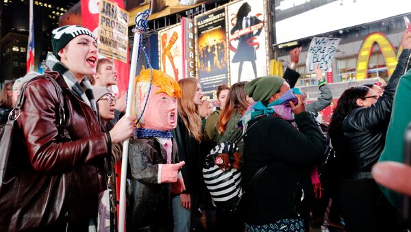 People protest against Republican president-elect Donald Trump in the neighborhood of Manhattan in New York, U.S., November 9, 2016 - Sputnik International