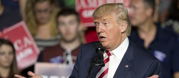 Republican presidential candidate Donald Trump gestures to the crowd during a rally in Roanoke, Va., Saturday, Sept. 24, 2016 Republican presidential candidate Donald Trump gestures to the crowd during a rally in Roanoke, Va., Saturday, Sept. 24, 2016 - Sputnik International