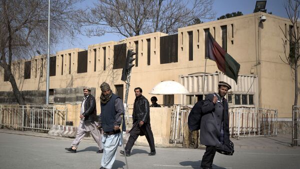 Afghans walk by the Serena hotel in downtown Kabul, Afghanistan, Friday, March 21, 2014 - Sputnik International