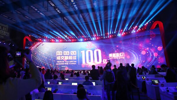 A screen shows real-time data of transactions at Alibaba Group's 11.11 Global shopping festival opening, in Shenzhen, Guangdong province, China, November 11, 2016 - Sputnik International