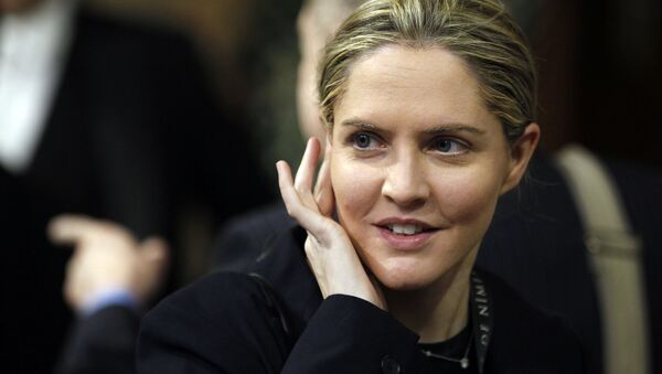 Then Conservative Member of Parliament Louise Mensch arrives in the Members' Lobby of the House of Commons to attend the State Opening of Parliament at the Palace of Westminster in London on May 9, 2012. - Sputnik International