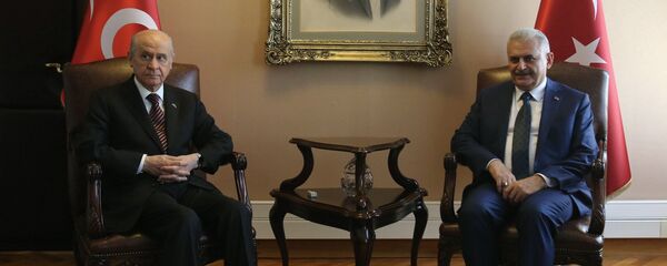 Turkish Prime Minister Binali Yildirim (R) and Nationalist Movement Party (MHP) Devlet Bahceli (L) pose for a photograph during their meeting at Turkish Grand National Assembly (TBMM) in Ankara, on August 01, 2016 Turkish Prime Minister Binali Yildirim (R) and Nationalist Movement Party (MHP) Devlet Bahceli (L) pose for a photograph during their meeting at Turkish Grand National Assembly (TBMM) in Ankara, on August 01, 2016 - Sputnik International