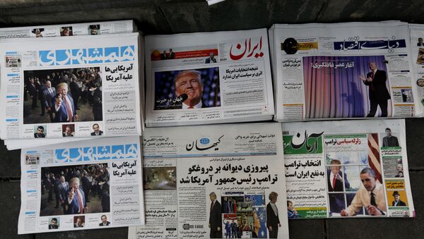 A picture taken on November 10, 2016 in the Iranian capital Tehran shows local newspapers displaying articles on US president-elect Donald Trump a day after his election - Sputnik International