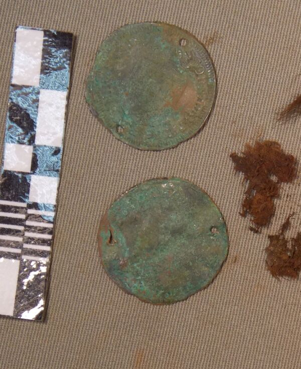 Counting tokens with a portrait of Louis XIV King of France and Navarre Counting tokens with a portrait of Louis XIV King of France and Navarre - Sputnik International