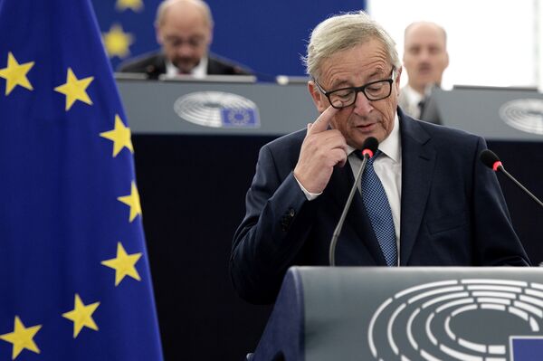European Commission's President Jean-Claude Juncker delivers a speech as he makes his State of the Union address to the European Parliament in Strasbourg, eastern France, on September 14, 2016. European Commission's President Jean-Claude Juncker delivers a speech as he makes his State of the Union address to the European Parliament in Strasbourg, eastern France, on September 14, 2016. - Sputnik International