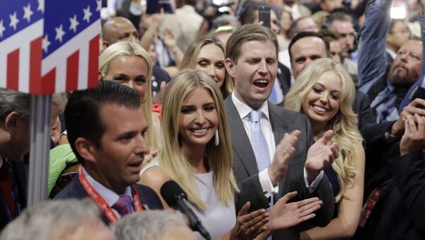 Republican Presidential Candidate Donald Trump's children Donald Trump, Jr., Ivanka Trump, Eric Trump and Tiffany Trump celebrate on the convention floor during the second day session of the Republican National Convention in Cleveland,19 July 2016.  - Sputnik International