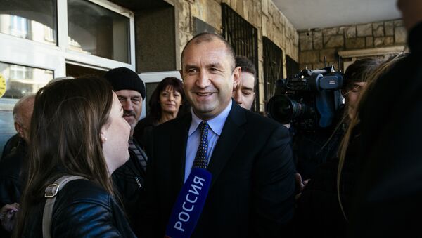 Former head of the Bulgarian airforce Rumen Radev, candidate of the opposition Socialists talks to the media after voting for the presidential elections at a polling station in Sofia - Sputnik International