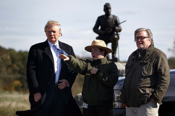 Interpretive park ranger Caitlin Kostic, center, gives a tour near the high-water mark of the Confederacy at Gettysburg National Military Park to Republican presidential candidate Donald Trump, left, and campaign CEO Steve Bannon, Saturday, Oct. 22, 2016, in Gettysburg. - Sputnik International